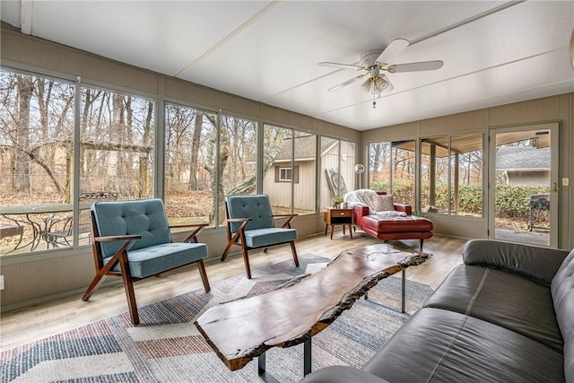 1 Syston Ln, Bella Vista, AR 72714 - sunroom featuring an outdoor living space, a ceiling fan, and wood finished floors