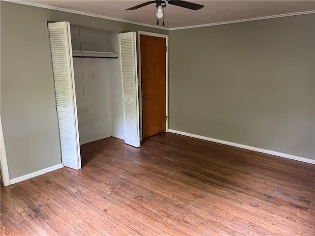 1445 Viewpoint Dr, Fayetteville, AR 72701 - unfurnished bedroom featuring wood finished floors, a closet, crown molding, and a ceiling fan