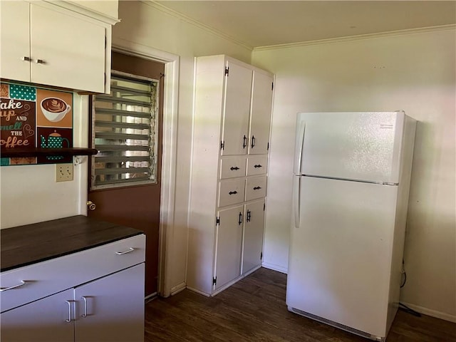 1445 Viewpoint Dr, Fayetteville, AR 72701 - kitchen featuring freestanding refrigerator, ornamental molding, dark wood-style flooring, white cabinetry, and wooden counters