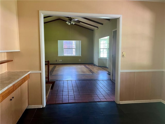 1445 Viewpoint Dr, Fayetteville, AR 72701 - hallway with dark tile patterned flooring and baseboards