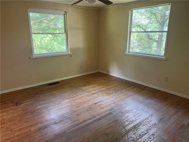 1445 Viewpoint Dr, Fayetteville, AR 72701 - unfurnished room with wood-type flooring, crown molding, and a ceiling fan