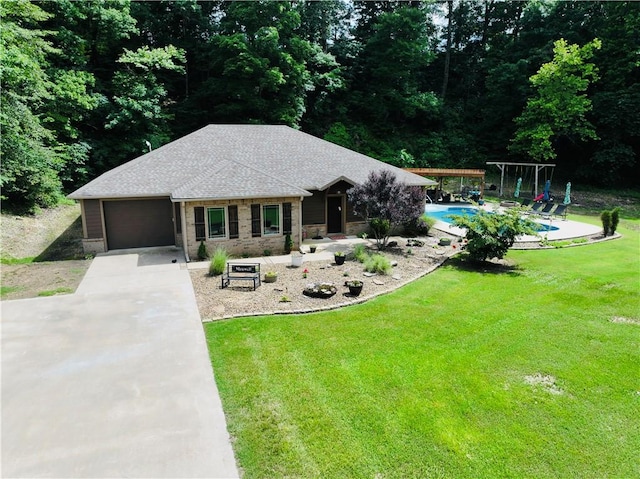 19123 Nokes Farm Rd, Siloam Springs, AR 72761 - view of front of property with driveway, a front lawn, an attached garage, and an outdoor pool
