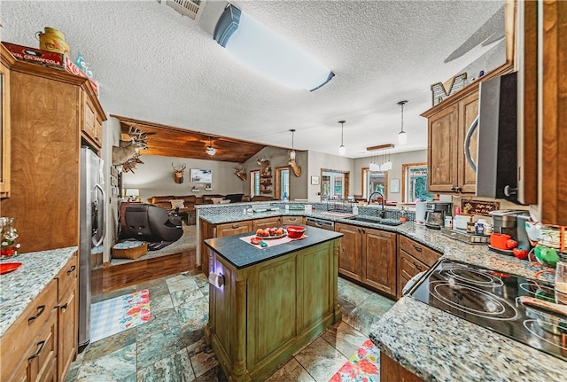 19123 Nokes Farm Rd, Siloam Springs, AR 72761 - kitchen with stainless steel appliances, a peninsula, brown cabinets, a textured ceiling, and open floor plan