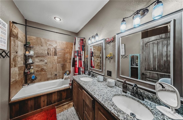 19123 Nokes Farm Rd, Siloam Springs, AR 72761 - bathroom with a textured wall, shower / bath combo with shower curtain, double vanity, and tile patterned floors