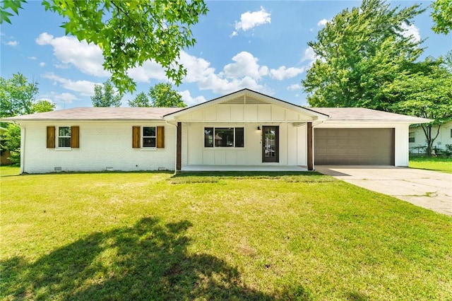 1916 S 12th St, Rogers, AR 72758 - ranch-style home with an attached garage, board and batten siding, driveway, a front yard, and brick siding