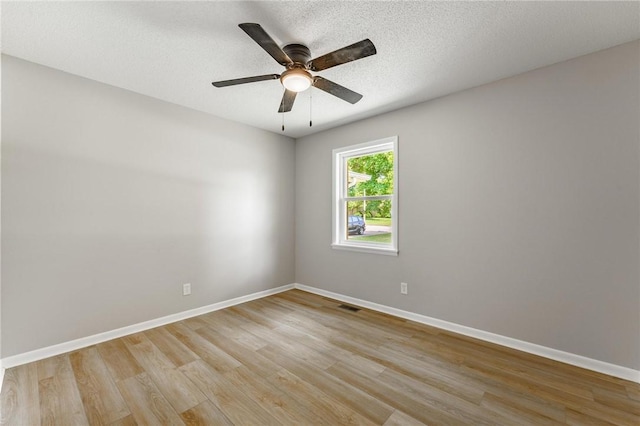 1916 S 12th St, Rogers, AR 72758 - unfurnished room featuring light wood finished floors and a ceiling fan