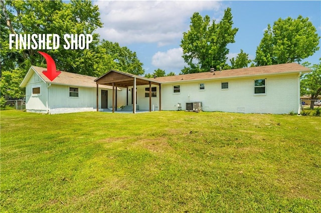1916 S 12th St, Rogers, AR 72758 - rear view of property with a yard, a patio area, and brick siding