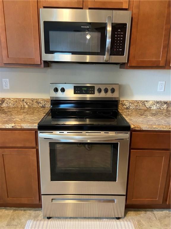 808 NW 69th Ave, Bentonville, AR 72713 - kitchen with appliances with stainless steel finishes