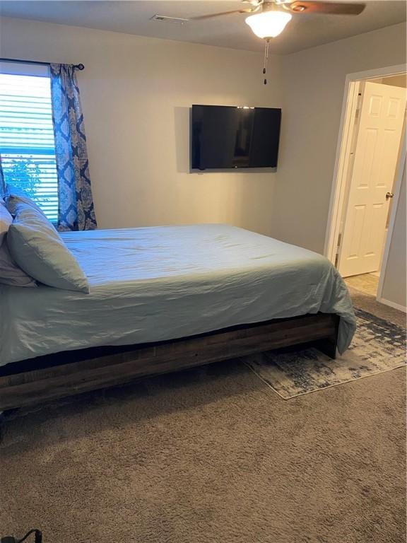 808 NW 69th Ave, Bentonville, AR 72713 - bedroom featuring carpet flooring and a ceiling fan