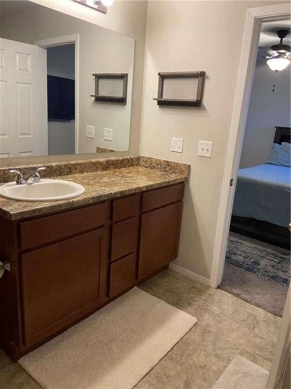 808 NW 69th Ave, Bentonville, AR 72713 - ensuite bathroom featuring vanity and a ceiling fan
