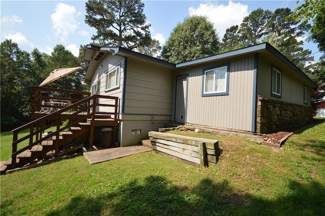 8096 Magnolia Ln, Rogers, AR 72756 - rear view of property featuring a yard, stone siding, a patio, and stairway