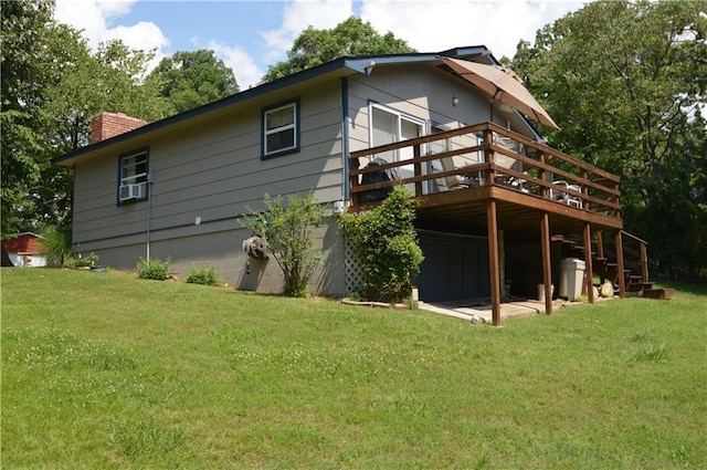 8096 Magnolia Ln, Rogers, AR 72756 - rear view of property featuring a chimney, a wooden deck, and a lawn