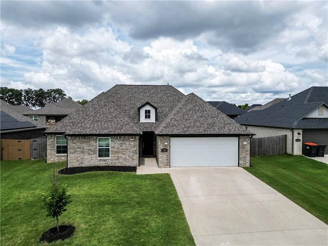 2756 Cassidy Ave, Springdale, AR 72764 - view of front of property with a garage, a shingled roof, brick siding, and driveway