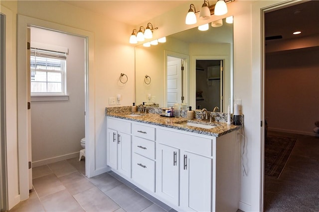 2756 Cassidy Ave, Springdale, AR 72764 - full bathroom featuring double vanity and tile patterned flooring