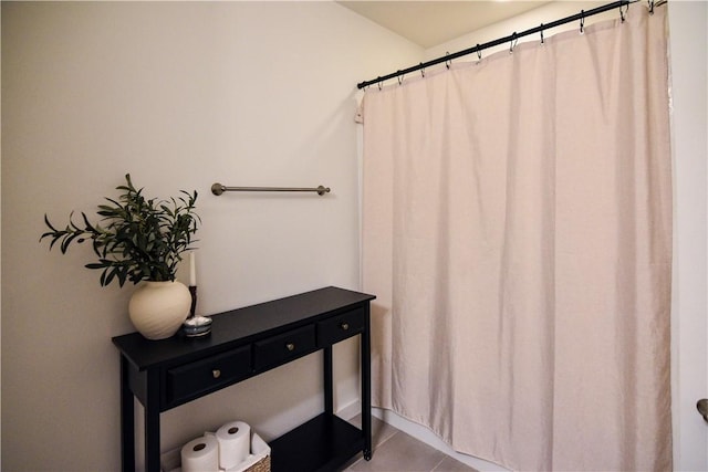 2756 Cassidy Ave, Springdale, AR 72764 - bathroom featuring a shower with shower curtain and tile patterned flooring