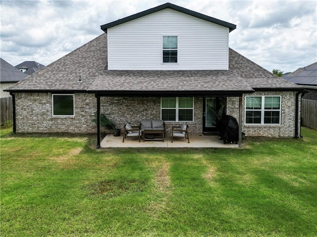 2756 Cassidy Ave, Springdale, AR 72764 - rear view of house with a shingled roof, an outdoor living space, a patio area, and brick siding