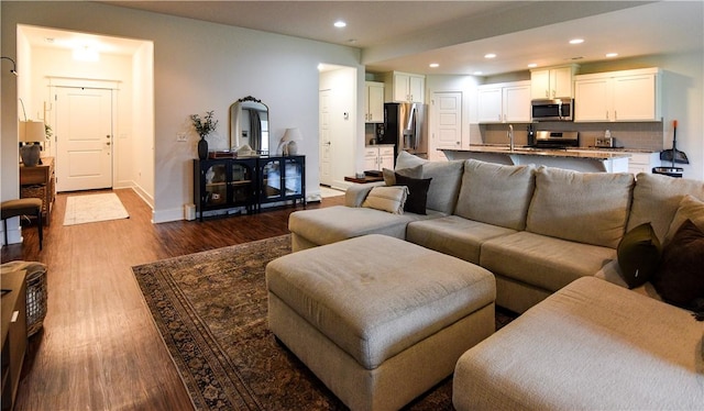 2756 Cassidy Ave, Springdale, AR 72764 - living room featuring dark wood-style floors and recessed lighting