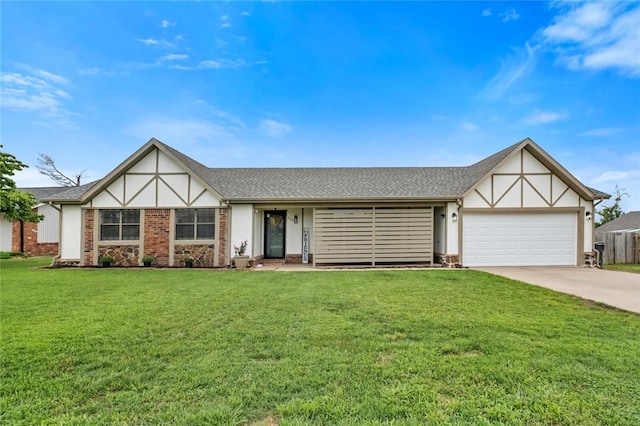 2509 Beau Dr, Rogers, AR 72758 - tudor home featuring concrete driveway, a garage, a front yard, and roof with shingles