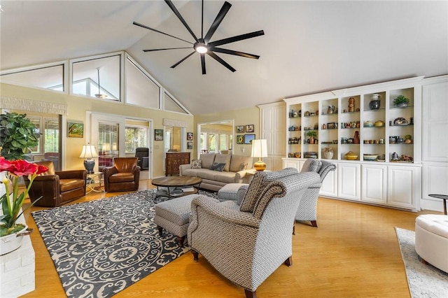 4 Skelton Dr, Bella Vista, AR 72715 - living room with high vaulted ceiling, ceiling fan, and light wood-type flooring