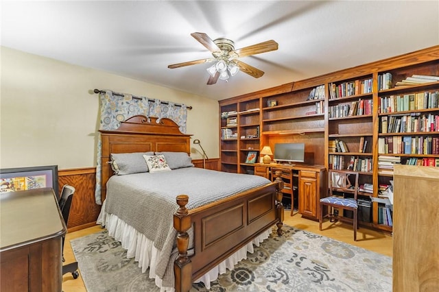 4 Skelton Dr, Bella Vista, AR 72715 - bedroom featuring an office area, light wood-style flooring, and a wainscoted wall