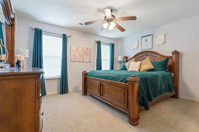 3405 SW Picasso Blvd, Bentonville, AR 72712 - bedroom with light carpet and ceiling fan