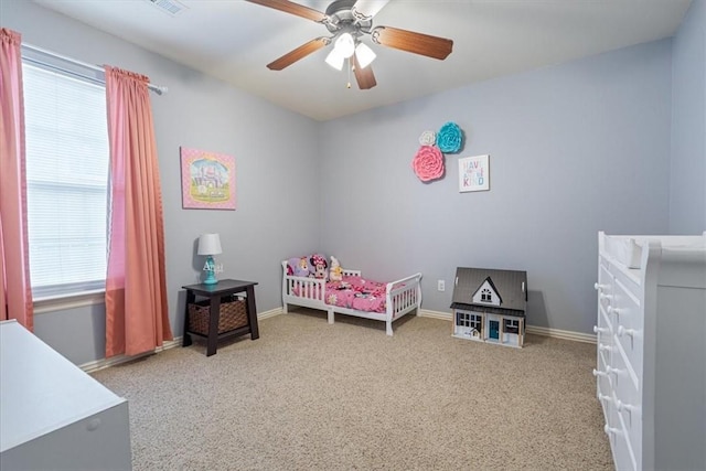 3405 SW Picasso Blvd, Bentonville, AR 72712 - bedroom with carpet floors, multiple windows, and ceiling fan
