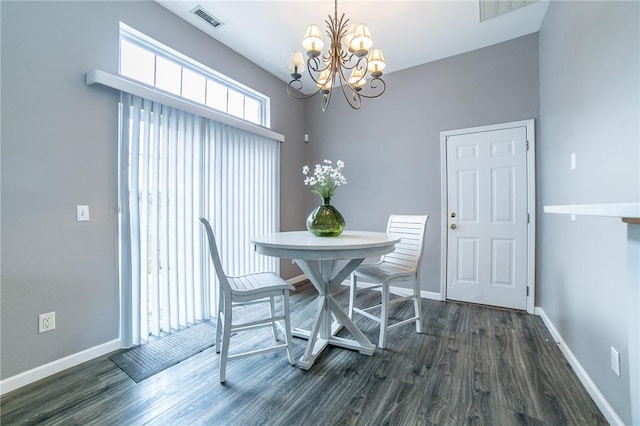 6682 Firefly Catch Ave, Springdale, AR 72762 - dining area featuring dark wood finished floors and a chandelier