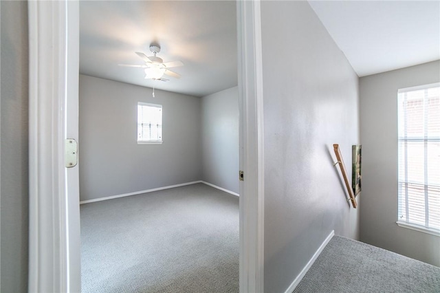 6682 Firefly Catch Ave, Springdale, AR 72762 - carpeted spare room with baseboards and a ceiling fan