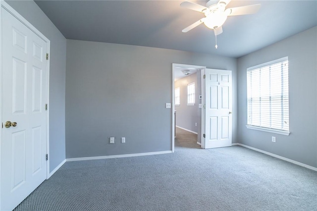6682 Firefly Catch Ave, Springdale, AR 72762 - unfurnished bedroom featuring carpet floors and a ceiling fan