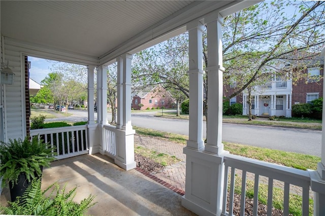 6682 Firefly Catch Ave, Springdale, AR 72762 - unfurnished sunroom featuring a residential view