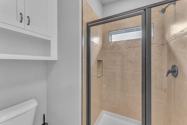 1315 W Magnolia St, Rogers, AR 72758 - full bathroom featuring a stall shower and toilet