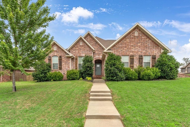 1315 W Magnolia St, Rogers, AR 72758 - traditional home featuring brick siding