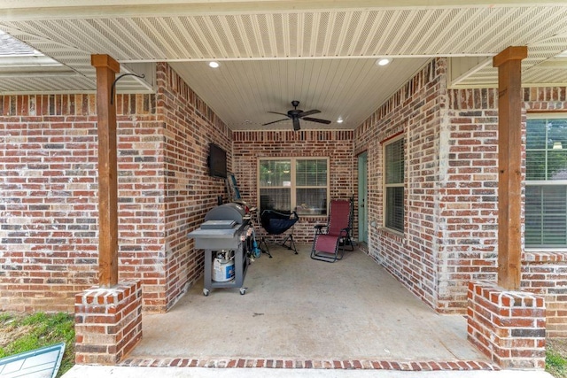 1315 W Magnolia St, Rogers, AR 72758 - view of patio with ceiling fan and grilling area