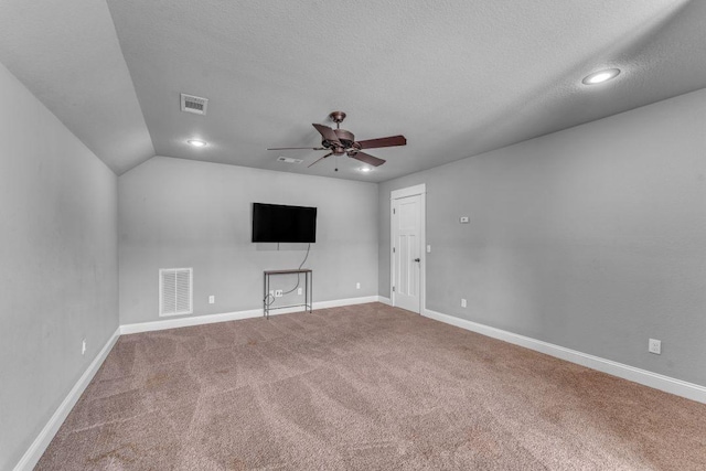 1315 W Magnolia St, Rogers, AR 72758 - unfurnished living room featuring carpet floors, a ceiling fan, recessed lighting, and a textured ceiling