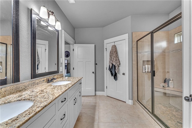 1315 W Magnolia St, Rogers, AR 72758 - full bathroom with double vanity, a shower stall, and tile patterned flooring