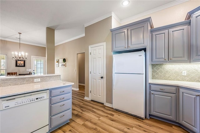 372 Niagara St, Elm Springs, AR 72762 - kitchen featuring white appliances, gray cabinetry, ornamental molding, a chandelier, and tasteful backsplash