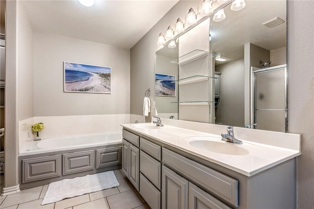 372 Niagara St, Elm Springs, AR 72762 - full bath featuring a garden tub, double vanity, tile patterned flooring, and a shower with door