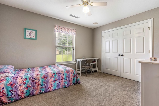 372 Niagara St, Elm Springs, AR 72762 - carpeted bedroom featuring a closet and ceiling fan