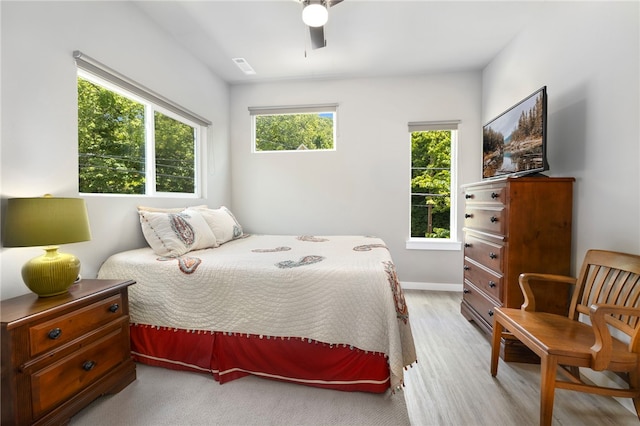 239 N Fletcher Ave, Fayetteville, AR 72701 - bedroom featuring light wood-style floors and a ceiling fan