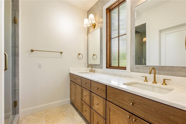 302 NW 5th St, Bentonville, AR 72712 - bathroom with double vanity and a shower with door