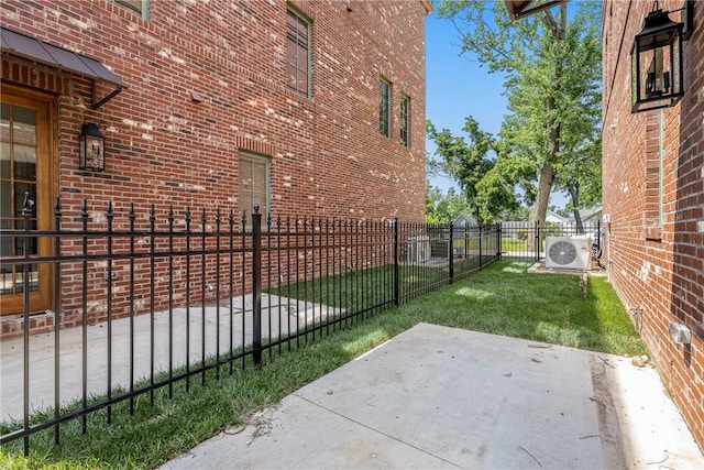 302 NW 5th St, Bentonville, AR 72712 - fenced yard featuring a patio area
