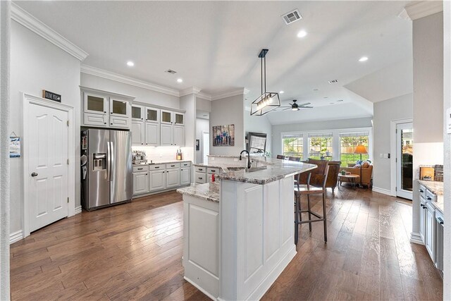 11 Darian Dr, Bentonville, AR 72712 - kitchen featuring stainless steel fridge with ice dispenser, ceiling fan, crown molding, dark wood-type flooring, and open floor plan