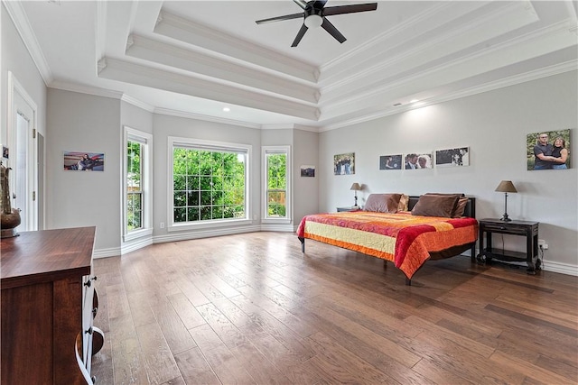 11 Darian Dr, Bentonville, AR 72712 - bedroom with a tray ceiling, hardwood / wood-style flooring, ornamental molding, and a ceiling fan