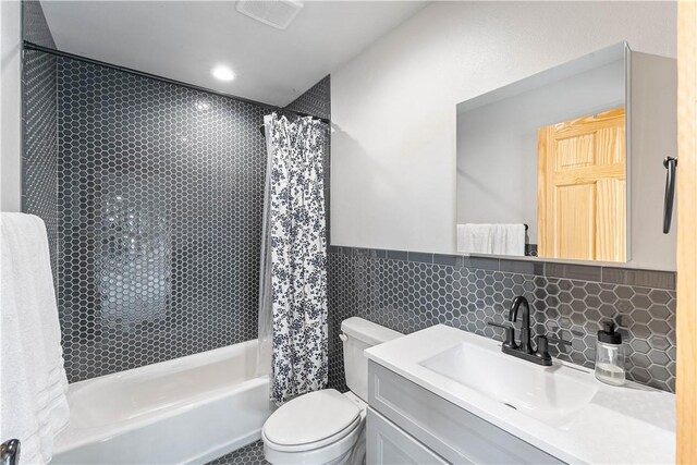 11 Darian Dr, Bentonville, AR 72712 - full bath with vanity, shower / bath combination with curtain, and tile walls