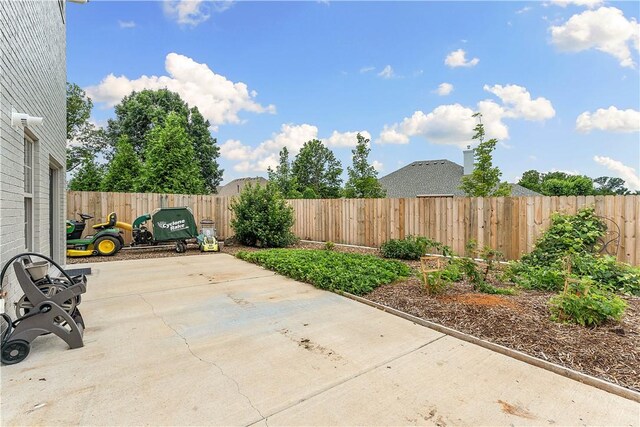 11 Darian Dr, Bentonville, AR 72712 - fenced backyard with a patio