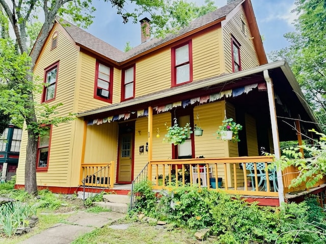 1 Ridgeway Ave, Eureka Springs, AR 72632 - view of front of property featuring covered porch and a chimney