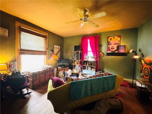 1 Ridgeway Ave, Eureka Springs, AR 72632 - living area featuring wood finished floors, a ceiling fan, and an office area