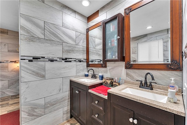 594 Madison 8650, Huntsville, AR 72740 - bathroom with double vanity, tile walls, and decorative backsplash