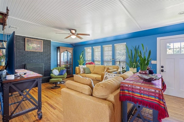 20490 Rocky Branch Rd, Rogers, AR 72756 - living room with ceiling fan and wood finished floors