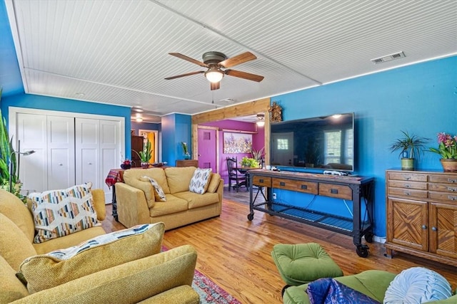 20490 Rocky Branch Rd, Rogers, AR 72756 - living room with a ceiling fan and wood finished floors